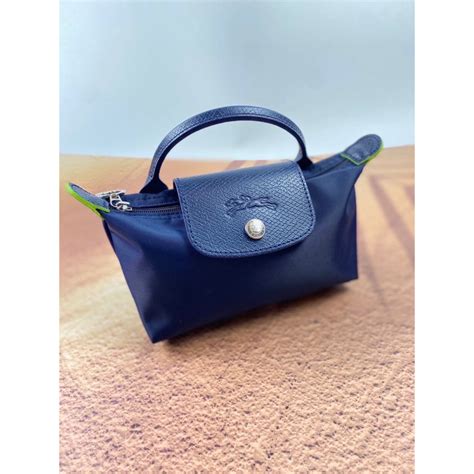 แนะนำหน่อยจ้า longchamp สี navy หรือ bilberry ดี .